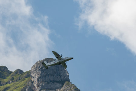 Mollis, Switzerland, August 18, 2023 C-FPSH Dornier 228.202 aircraft during an air show in the alpsのeditorial素材