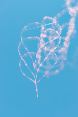 Mollis, Switzerland, August 18, 2023 RAF Falcons Parachuters are doing a performance with a lot of smoke during an air displayのeditorial素材