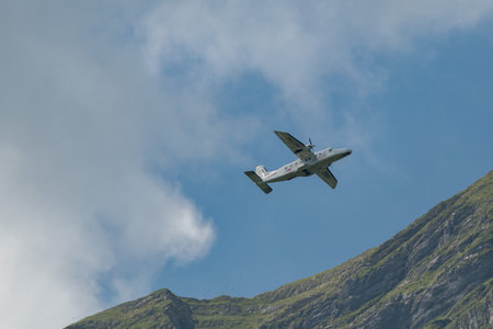 Mollis, Switzerland, August 18, 2023 C-FPSH Dornier 228.202 aircraft during an air show in the alpsのeditorial素材