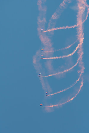 Mollis, Switzerland, August 18, 2023 RAF Falcons Parachuters are doing a performance with a lot of smoke during an air displayのeditorial素材