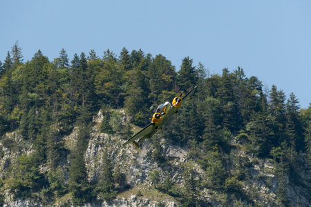 Mollis, Switzerland, August 18, 2023 Beechcraft Model 18 historic aircraft performance during an air displayのeditorial素材