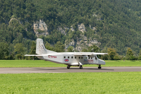 Mollis, Switzerland, August 18, 2023 C-FPSH Dornier 228-202 aircraft is taxiing on the runwayのeditorial素材