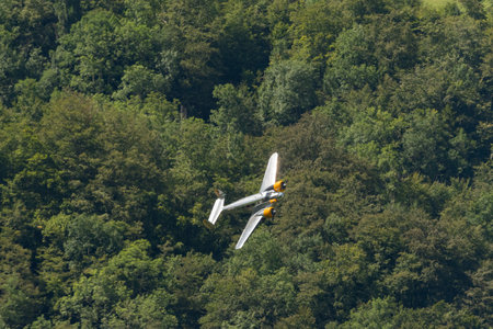 Mollis, Switzerland, August 18, 2023 Beechcraft Model 18 historic aircraft performance during an air displayのeditorial素材