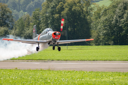 Mollis, Switzerland, August 18, 2023 HB-RCJ Pilatus P-3-05 historic propeller aircraft is taking off from runway 01のeditorial素材