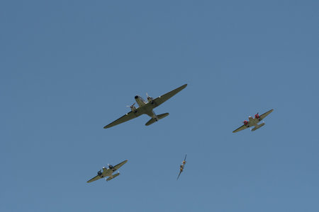 Mollis, Switzerland, August 18, 2023 Douglas DC-3C and Beechcraft Model 18 nostalgic aircraft performance during an air showのeditorial素材