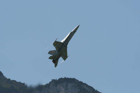 Mollis, Switzerland, August 18, 2023 Swiss military McDonnell Douglas F/A-18 hornet fighter is doing performances during an air displayのeditorial素材
