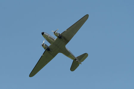 Mollis, Switzerland, August 18, 2023 Douglas DC-3C historic aircraft performance during an air showのeditorial素材