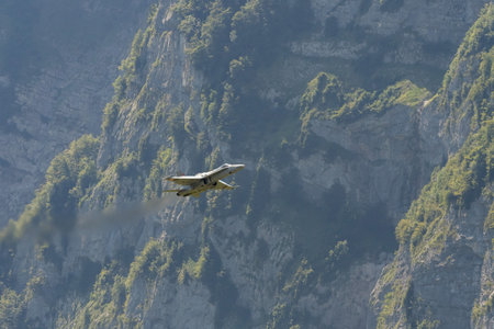 Mollis, Switzerland, August 18, 2023 Swiss military McDonnell Douglas F/A-18 hornet fighter is doing performances during an air displayのeditorial素材
