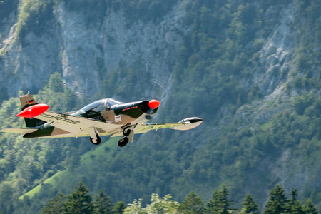 Mollis, Switzerland, August 18, 2023 SIAI Marchetti SF260 aircraft is taking off from runway 01のeditorial素材