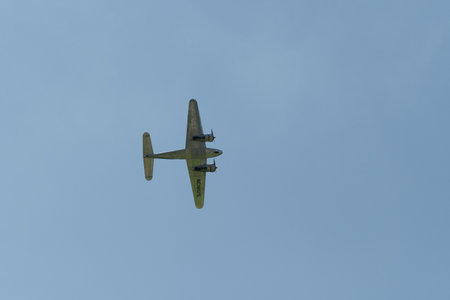 Mollis, Switzerland, August 18, 2023 NC-18125 Lockheed Model 12 Electra Junior aircraft is performing during an air showのeditorial素材