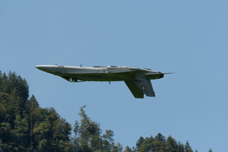 Mollis, Switzerland, August 18, 2023 Swiss military McDonnell Douglas F/A-18 hornet fighter is doing performances during an air displayのeditorial素材