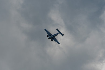 Mollis, Switzerland, August 18, 2023 NC-18125 Lockheed Model 12 Electra Junior aircraft is performing during an air showのeditorial素材
