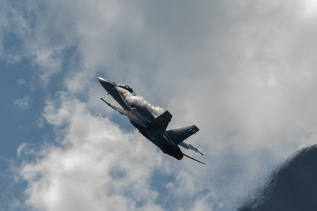 Mollis, Switzerland, August 18, 2023 Swiss military McDonnell Douglas F/A-18 hornet fighter is doing performances during an air displayのeditorial素材
