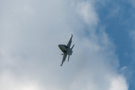 Mollis, Switzerland, August 18, 2023 Swiss military McDonnell Douglas F/A-18 hornet fighter is doing performances during an air displayのeditorial素材
