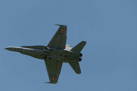 Mollis, Switzerland, August 18, 2023 Swiss military McDonnell Douglas F/A-18 hornet fighter is doing...