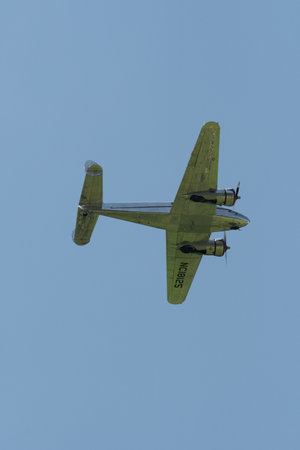 Mollis, Switzerland, August 18, 2023 NC-18125 Lockheed Model 12 Electra Junior aircraft is performing during an air showのeditorial素材