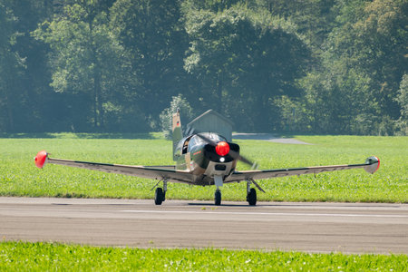 Mollis, Switzerland, August 18, 2023 SIAI Marchetti SF260 acrobatic aircraft is taxiing on the runwayのeditorial素材