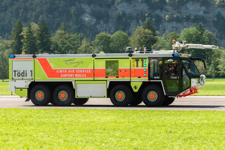 Mollis, Switzerland, August 18, 2023 Firefighter truck demonstration during an air showのeditorial素材