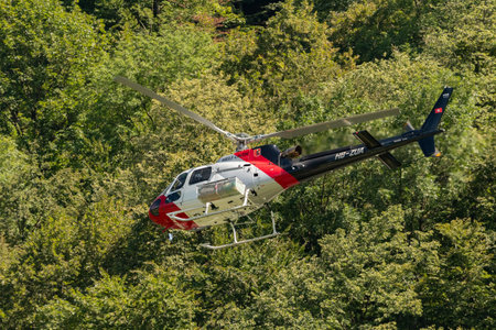 Mollis, Switzerland, August 18, 2023 HB-ZUA AS-350B H125 helicopter during an air displayのeditorial素材