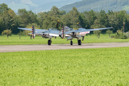 Mollis, Switzerland, August 18, 2023 N-25Y Lockheed P-38L Lightning historic aircraft is taxiing on...