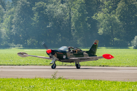 Mollis, Switzerland, August 18, 2023 SIAI Marchetti SF260 acrobatic aircraft is taxiing on the runwayのeditorial素材
