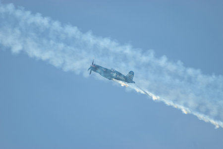 Mollis, Switzerland, August 18, 2023 OE-EAS Chance Vought F4U-4 Corsair historic aircraft performing during an air displayのeditorial素材
