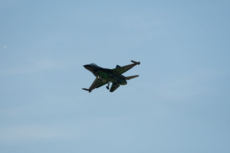 Mollis, Switzerland, August 18, 2023 Lockheed Martin F-16AM Falcon fighter is performing during an air displayのeditorial素材