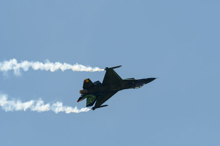Mollis, Switzerland, August 18, 2023 Lockheed Martin F-16AM Falcon fighter is performing during an air displayのeditorial素材