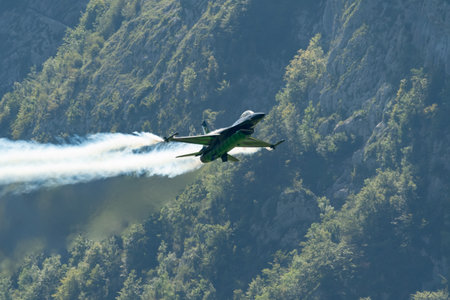 Mollis, Switzerland, August 18, 2023 Lockheed Martin F-16AM Falcon fighter is performing during an air displayのeditorial素材