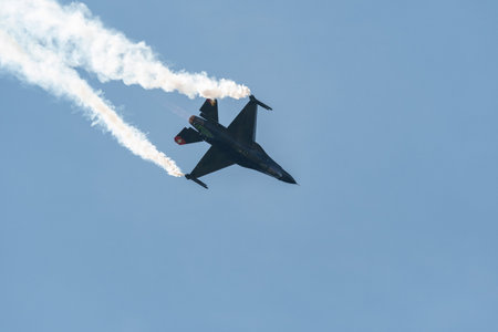 Mollis, Switzerland, August 18, 2023 Lockheed Martin F-16AM Falcon fighter is performing during an air displayのeditorial素材