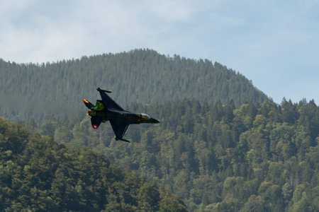 Mollis, Switzerland, August 18, 2023 Lockheed Martin F-16AM Falcon fighter is performing during an air displayのeditorial素材