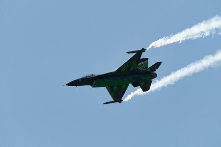 Mollis, Switzerland, August 18, 2023 Lockheed Martin F-16AM Falcon fighter is performing during an air displayのeditorial素材