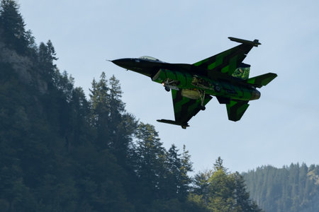 Mollis, Switzerland, August 18, 2023 Lockheed Martin F-16AM Falcon fighter is performing during an air displayのeditorial素材