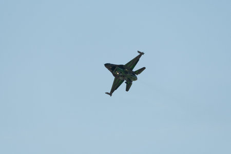 Mollis, Switzerland, August 18, 2023 Lockheed Martin F-16AM Falcon fighter is performing during an air displayのeditorial素材