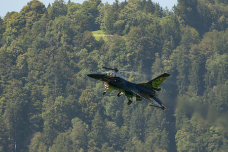 Mollis, Switzerland, August 18, 2023 Lockheed Martin F-16AM Falcon fighter is performing during an air displayのeditorial素材