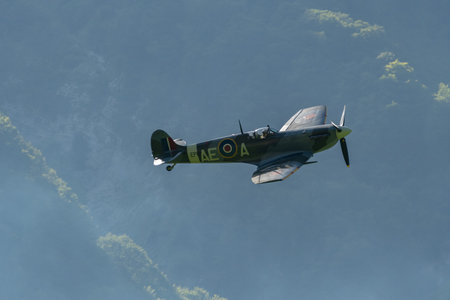 Mollis, Switzerland, August 18, 2023 EP-120 Supermarine LF Mk Vb Spitfire historic aircraft is performing during an air showのeditorial素材