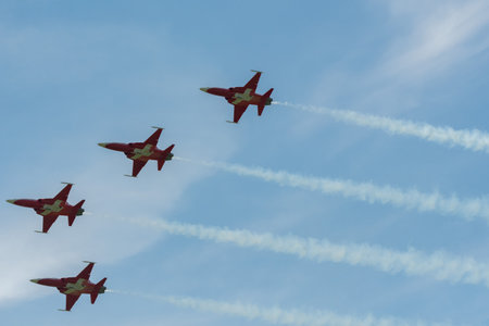 Mollis, Switzerland, August 18, 2023 Patrouille Suisse Northrop F-5E Tiger II military jet doing acrobatic flights during an air displayのeditorial素材