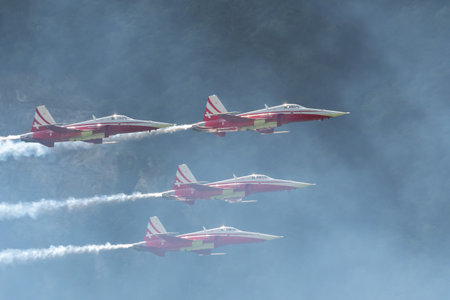 Mollis, Switzerland, August 18, 2023 Patrouille Suisse Northrop F-5E Tiger II military jet doing acrobatic flights during an air displayのeditorial素材