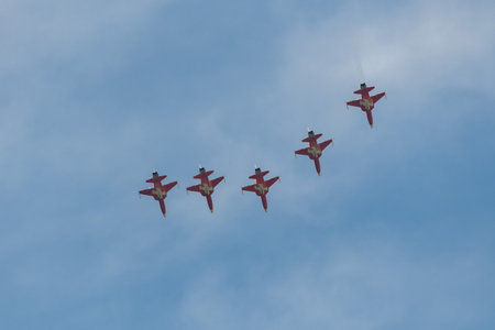 Mollis, Switzerland, August 18, 2023 Patrouille Suisse Northrop F-5E Tiger II military jet doing acrobatic flights during an air displayのeditorial素材