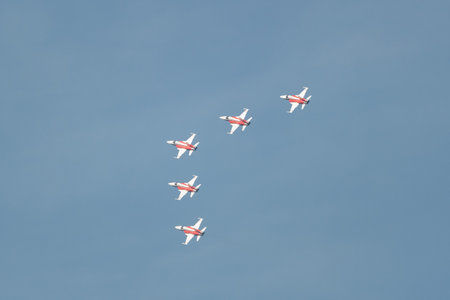 Mollis, Switzerland, August 18, 2023 Patrouille Suisse Northrop F-5E Tiger II military jet doing acrobatic flights during an air displayのeditorial素材