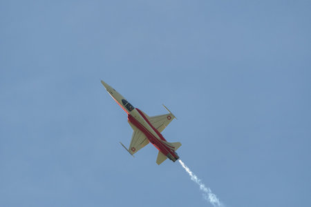 Mollis, Switzerland, August 18, 2023 Patrouille Suisse Northrop F-5E Tiger II military jet doing acrobatic flights during an air displayのeditorial素材