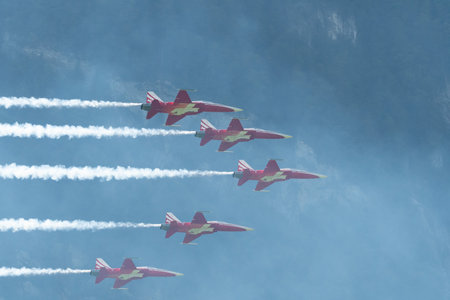 Mollis, Switzerland, August 18, 2023 Patrouille Suisse Northrop F-5E Tiger II military jet doing acrobatic flights during an air displayのeditorial素材