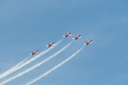 Mollis, Switzerland, August 18, 2023 Patrouille Suisse Northrop F-5E Tiger II military jet doing acrobatic flights during an air displayのeditorial素材
