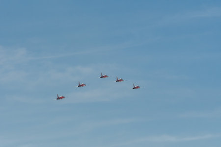 Mollis, Switzerland, August 18, 2023 Patrouille Suisse Northrop F-5E Tiger II military jet doing acrobatic flights during an air displayのeditorial素材