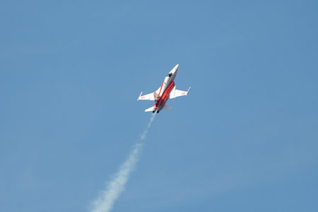 Mollis, Switzerland, August 18, 2023 Patrouille Suisse Northrop F-5E Tiger II military jet doing acrobatic flights during an air displayのeditorial素材