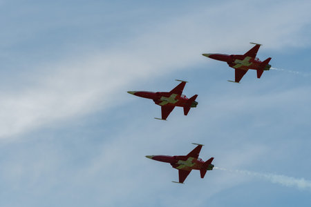 Mollis, Switzerland, August 18, 2023 Patrouille Suisse Northrop F-5E Tiger II military jet doing acrobatic flights during an air displayのeditorial素材