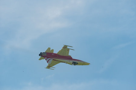 Mollis, Switzerland, August 18, 2023 Patrouille Suisse Northrop F-5E Tiger II military jet doing acrobatic flights during an air displayのeditorial素材