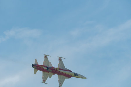 Mollis, Switzerland, August 18, 2023 Patrouille Suisse Northrop F-5E Tiger II military jet doing acrobatic flights during an air displayのeditorial素材