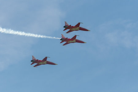 Mollis, Switzerland, August 18, 2023 Patrouille Suisse Northrop F-5E Tiger II military jet doing acrobatic flights during an air displayのeditorial素材