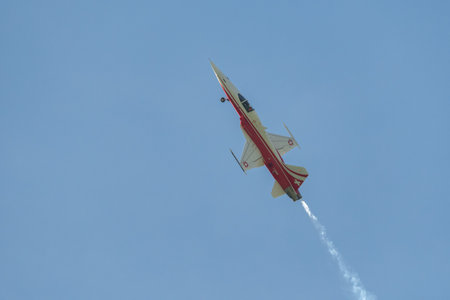 Mollis, Switzerland, August 18, 2023 Patrouille Suisse Northrop F-5E Tiger II military jet doing acrobatic flights during an air displayのeditorial素材